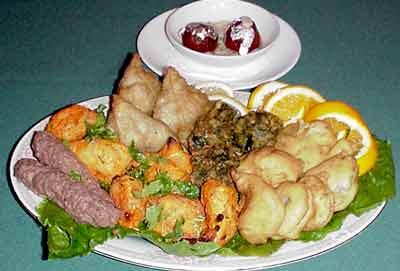 A composed platter of Indian Village tandoori specialties.